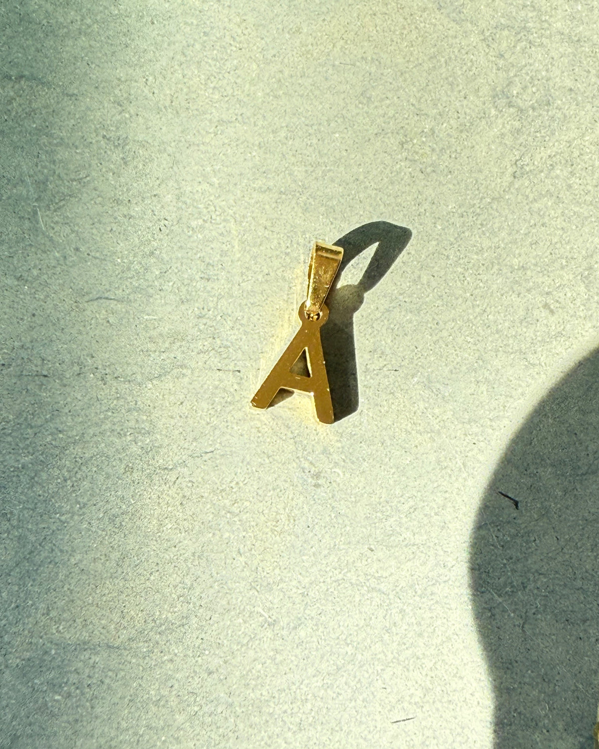 Stone letter necklace gold