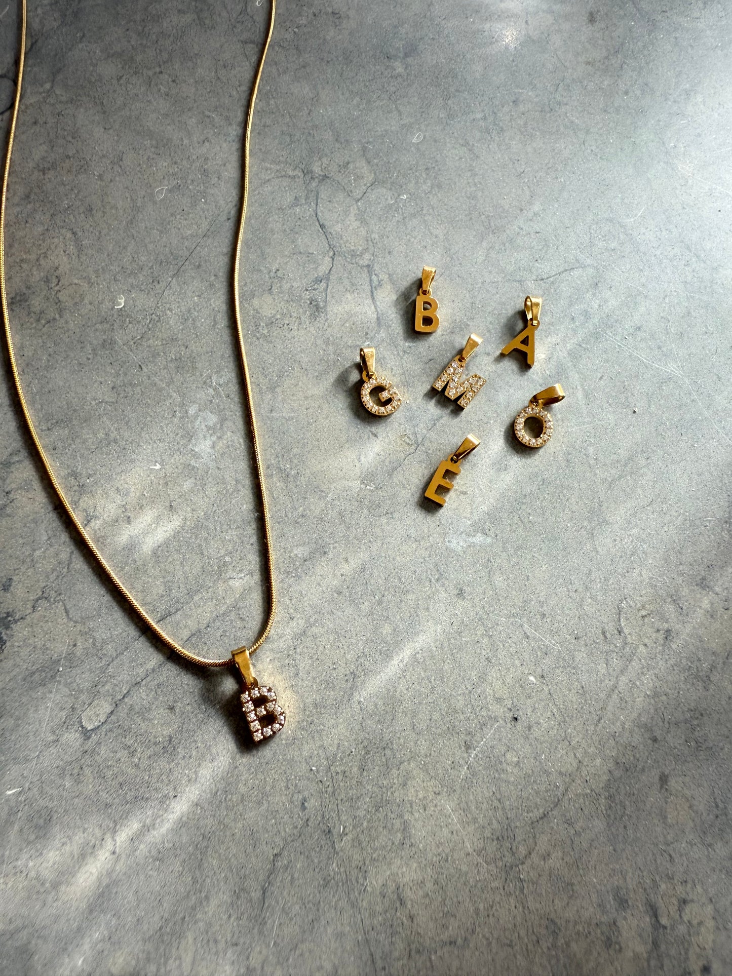 Stone letter necklace gold
